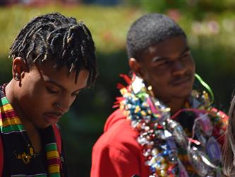 Two students graduating. 