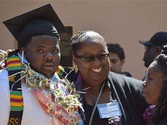 A student with a staff member.